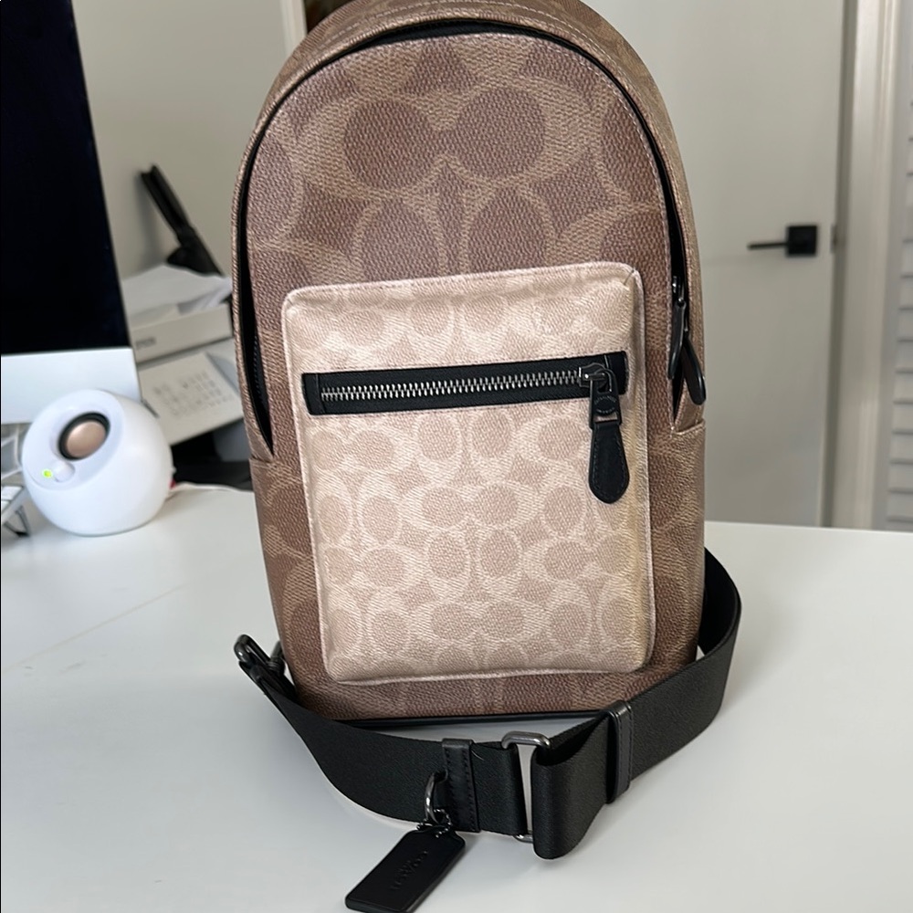 Coach Brown and Tan her/his bag